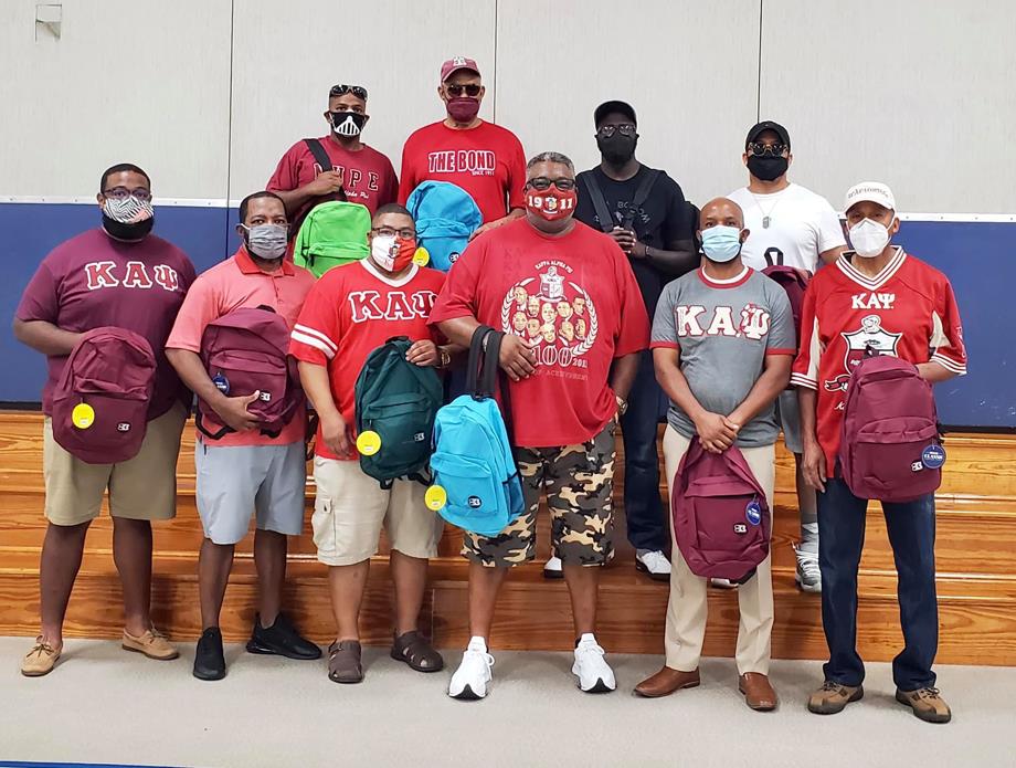 H.H. Beam Elementary received 96 book bags filled with school supplies from Kappa Alpha Psi fraternity.